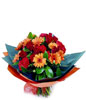 Roses, Gerberas and carnations in a hand bouquet