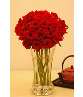 Two Dozen Red Roses With a Vase
