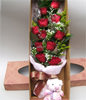 11 Red roses and A bear