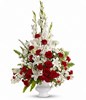 arrangement of red and white roses, oriental lilies, carnations and more