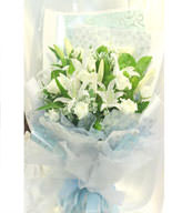 11 white roses and lilies