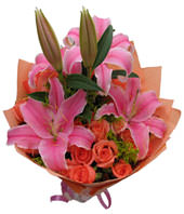 19 pink roses with 2 pink lilies around