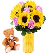 Sunflowers, pink roses and teddy bear