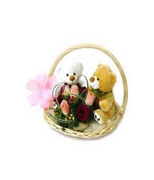 2 Teddies (6 inches each) with pink and red roses in a Basket