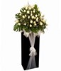 White Roses With Caspia arranged on a Box stand With White Tile Fabric