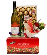 White wine, a box of chocolate, Ferrero Rocher & bouquet of a red roses