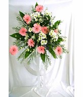 Flower arrangement of Pink Daisies/Gerberas with Small Flowers & Greens