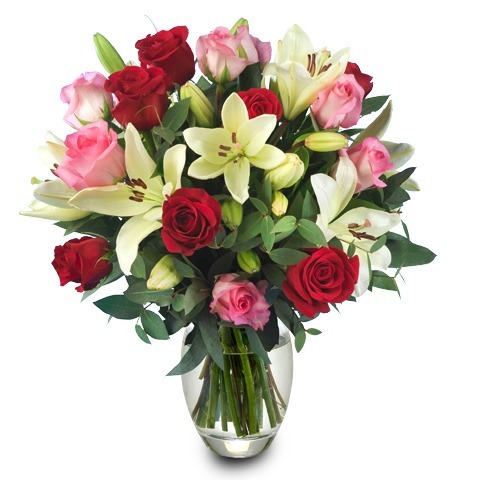 A Perfect Touch: 12 roses & 3 lilies (Vase included)