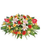 Table Basket -  Anthurium, Pink Lily , red sunflowers , champagne roses , pink long carnations , green leafy