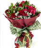 19 red roses, a small amount of peach carnations off Lacy and green leaves with