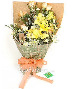 3 yellow lilies,6 champagne roses and 6 yellow carnations