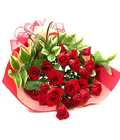 21 red roses with some gardenia and aspidistra