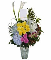 Purple and Yellow roses , Hydrangea , Lily and Filler in vase