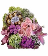 Arrangement of Pink rose, Hydrangea and Filler with Box of Chocolate