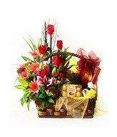 Basket Arrangement of Mixed Flowers with Ferrero Rocher Chocolate & Bottle of Sparkling Juice with Mixed Fruits
