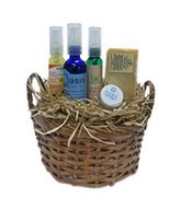 Basket of baby oil, aloe vera gel, hand sanitizer and more
