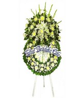 Funeral wreath With White Flowers and Greens
