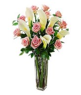 One dozen pink roses with white calla lilies