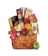 Assorted fruits and Gourmet Indulgence served in a Basket