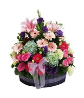 Pink Roses, Hydrangea, Gerberas, Carnation Stargezer Lilies, And Fillers in a Basket