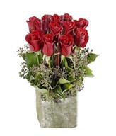 15 Red Roses in a classical glass vase