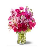 Arrangement of Pink roses, Lilies, Hydrangea and more in vase