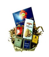 A Delight Hamper consist of Cookies, Butter Cookies, Four Different Packs of Tea. Presented in a Basket