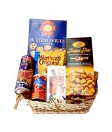 Treats of Chocolates, Wafers, Butter Cookies, Candies and many more. Presented in a Basket