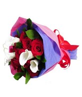 bouquet of red roses and white calla lily