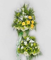 White Lily And Yellow Gerbera Arranged In Metal Stand