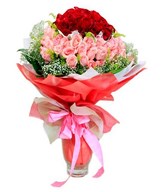 Well picked red and peach roses in an elegant bouquet