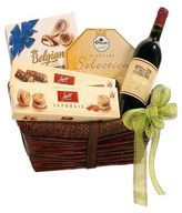 A Basket of Red Wine, 2 boxes of chocolate and 2 boxes of biscuits