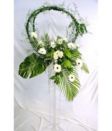 Flower arrangement of white daisies and carnations