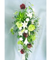 Floral arrangement of lilies, carnations and roses