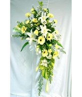 Flower arrangement of lilies and daisies