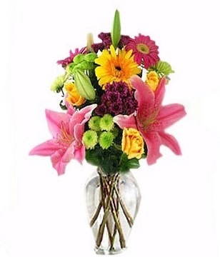 Pink lilies, yellow daisies and others in a bouquet
