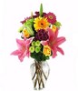 Pink lilies, yellow daisies and others in a bouquet