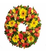 wreath of mixed roses with gerbera and daisies